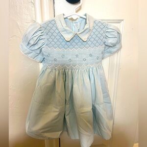Vintage Feltman Brothers blue hand smocked dress. No size listed-